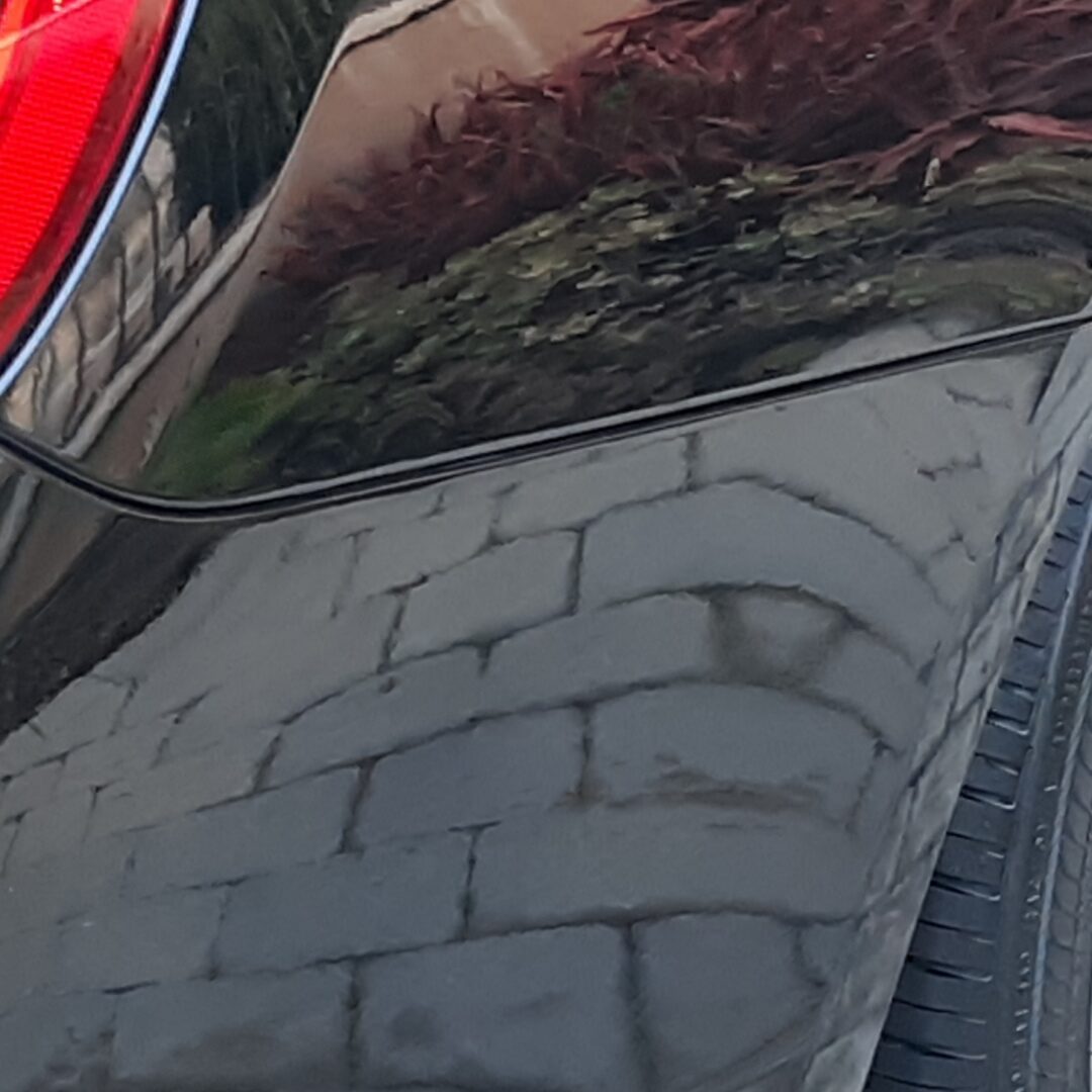 A close up of the tire on a car